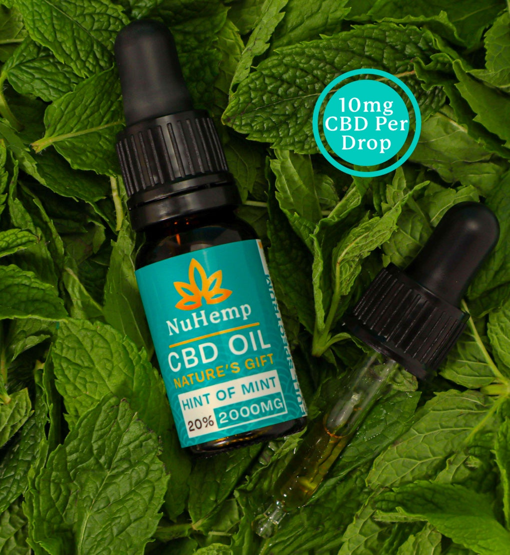 2000mg cbd oil on a bed of mint leaves
